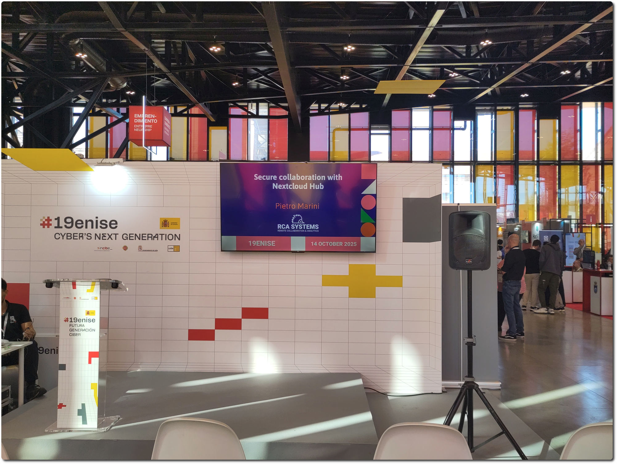 Speaker Corner View. On screen, first slide of RCA Systems presentation.